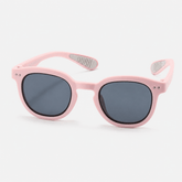 Kids flexible silicone prescription sunglasses with round frames, dark UV lenses, and non-slip ear grips.