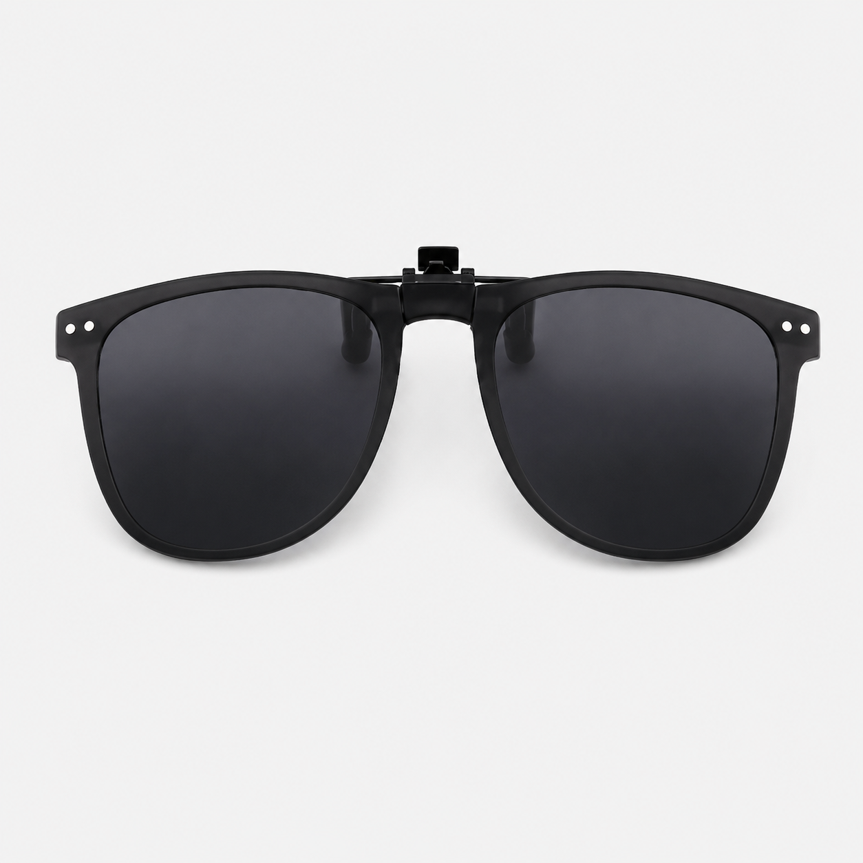 A black universal clip-on sunglass attachment designed to fit over kids’ prescription glasses for easy outdoor sun protection. 